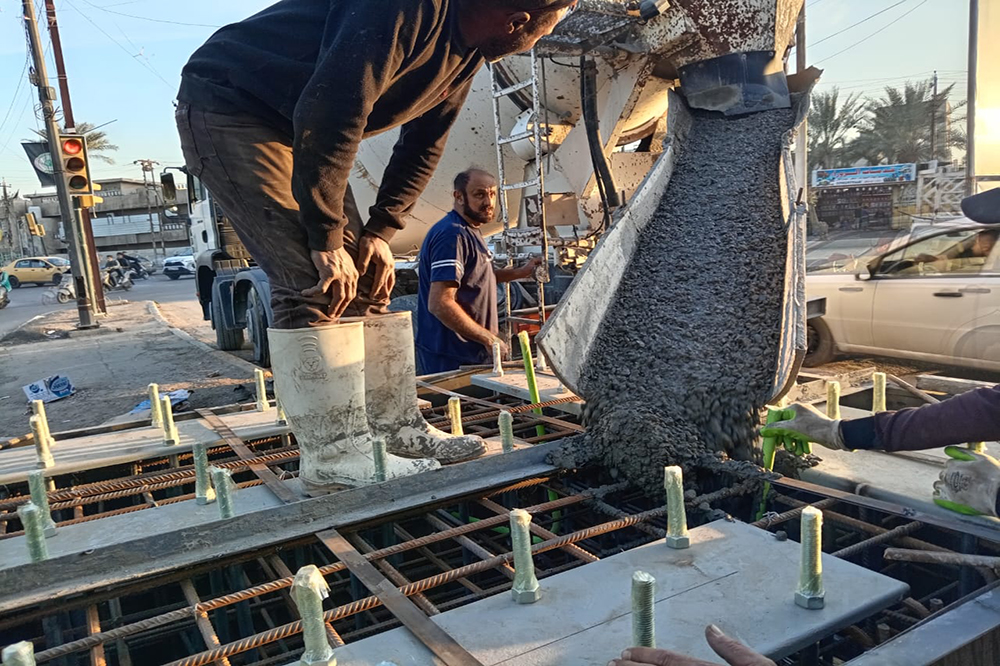 Works on gates and checkpoints at the entrances to the holy city of Kadhimiya, numbering (7)