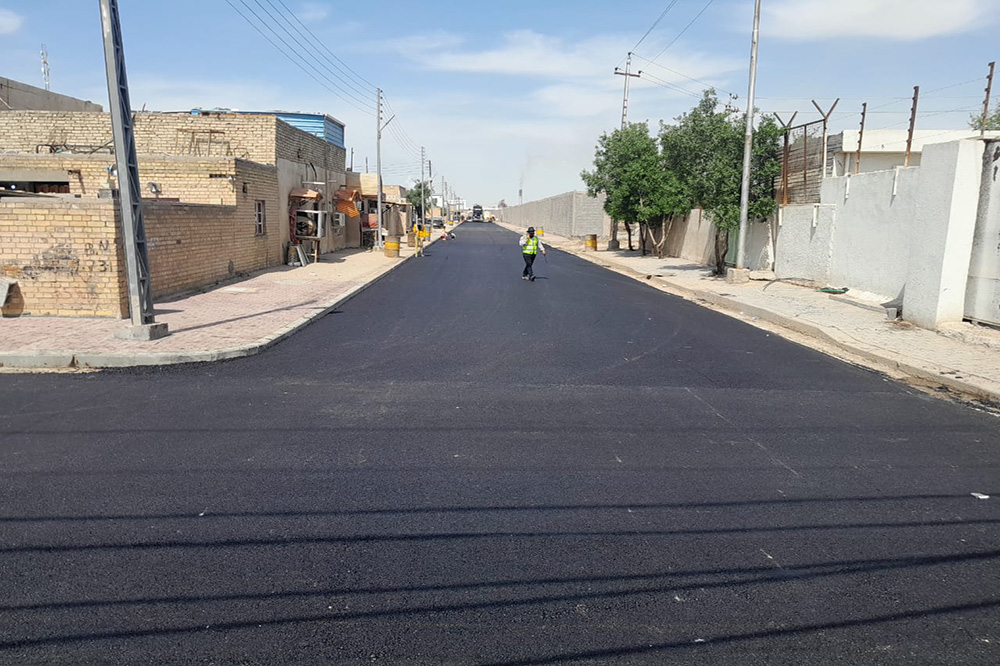 the project to rehabilitate the main and service streets and gardens for employees’ homes in the Doura Refinery in Baghdad Governorate
